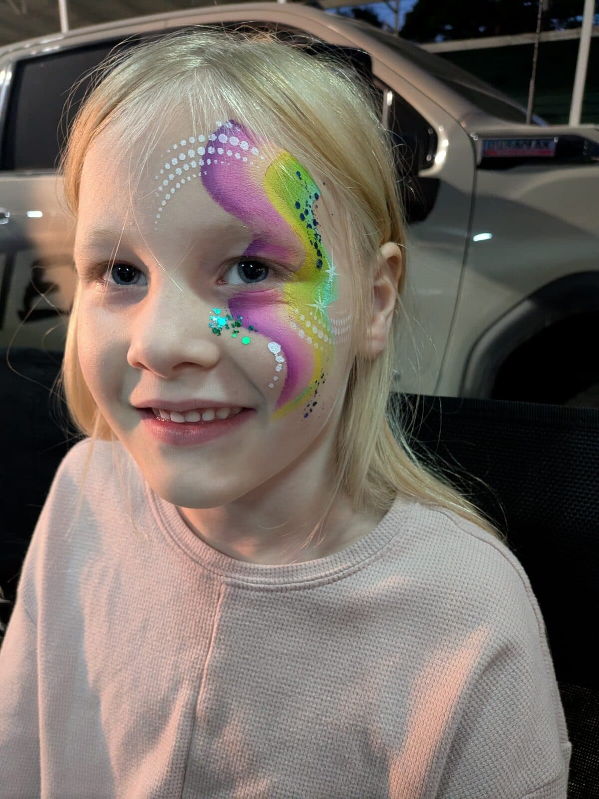 Pink and purple swirl face design