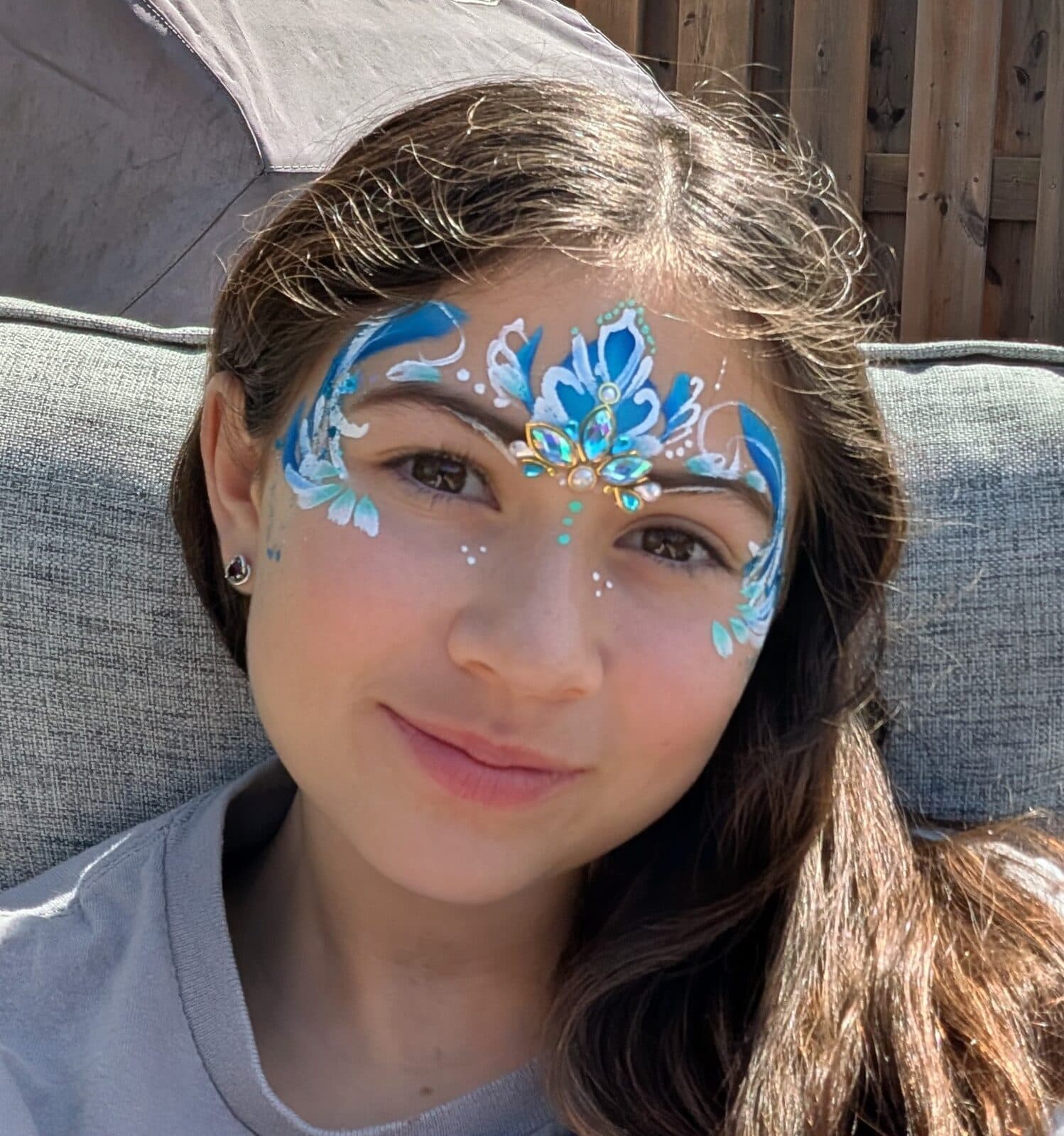 Blue and white crown face design